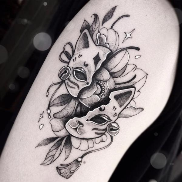 Broken Kitsune mask dotwork tattoo