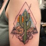 Bull skull and saguaro cactus tattoo