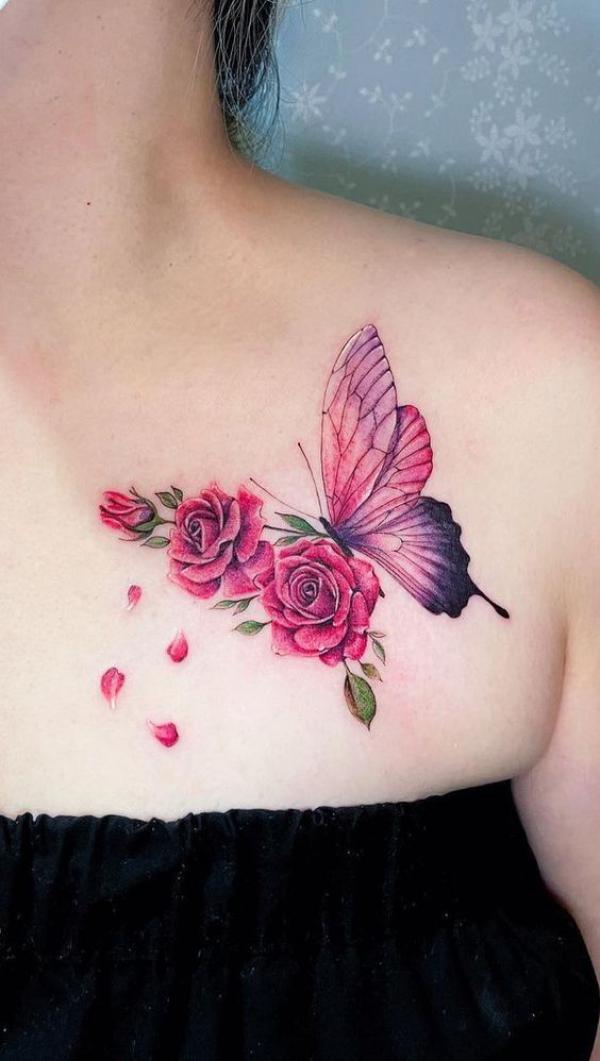 Butterfly and rose chest tattoo