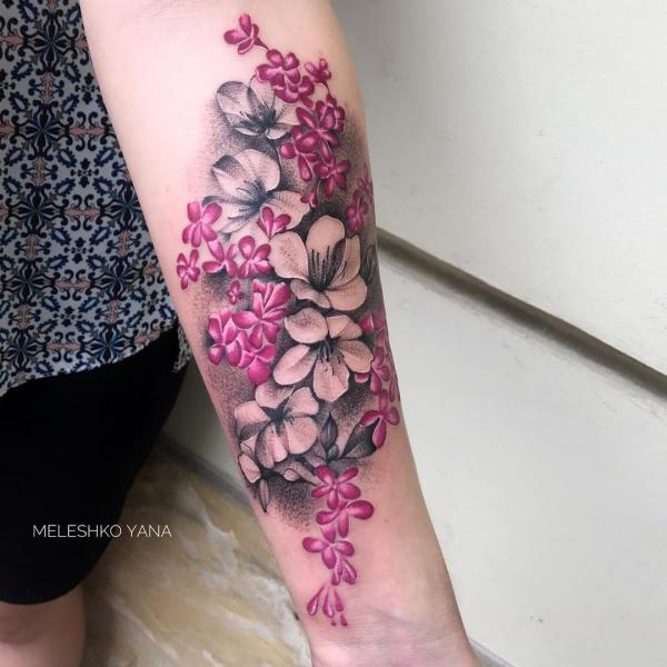 Cherry blossom and jasmine flower tattoo
