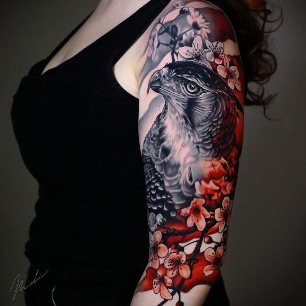 Cherry blossom and parrot tattoo