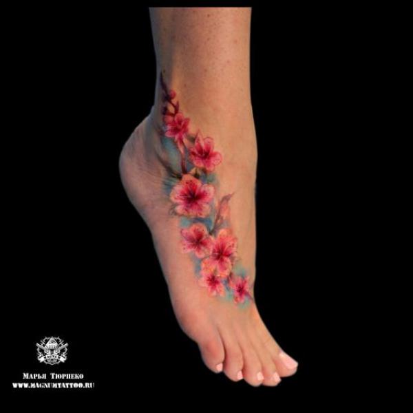 Cherry blossom foot tattoo