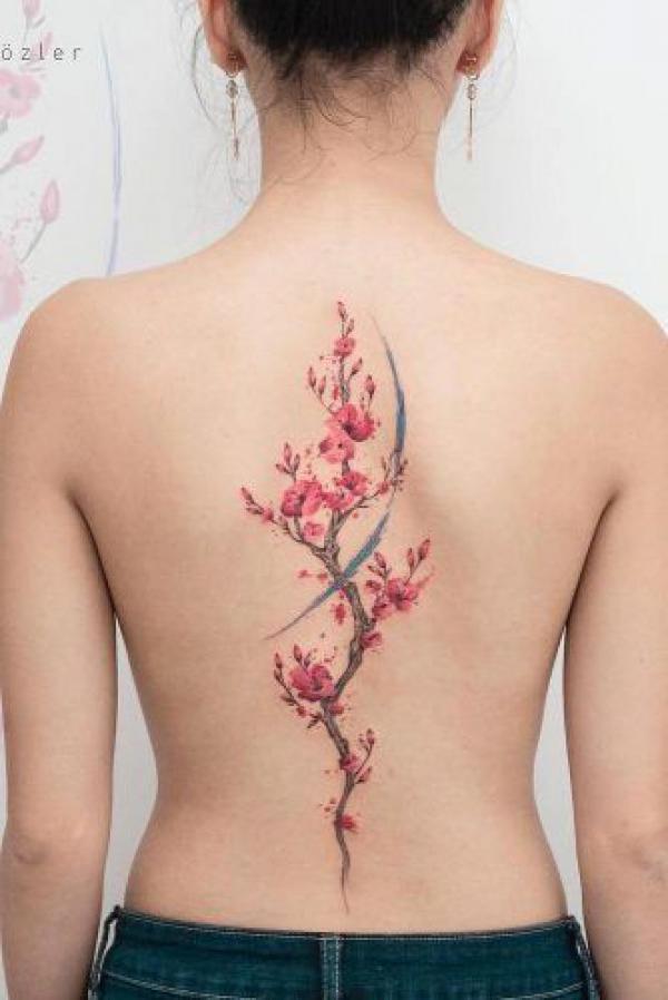 Cherry blossom tree spine tattoo