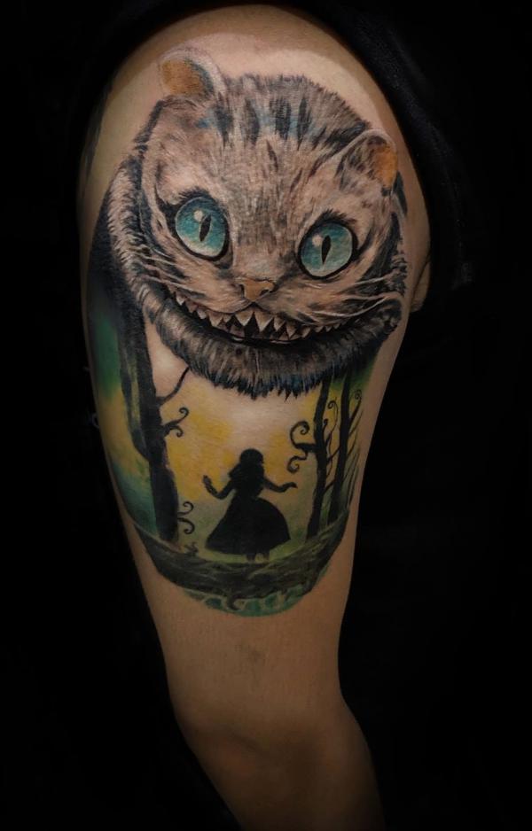 Cheshire Cat and Alice quarter sleeve tattoo