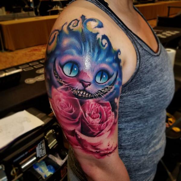 Cheshire Cat and rose tattoo