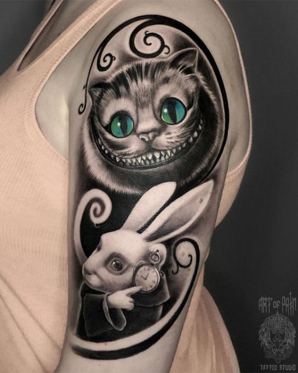 Cheshire Cat and the white rabbit half sleeve tattoo