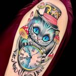 Cheshire Cat holding a clock tattoo sleeve