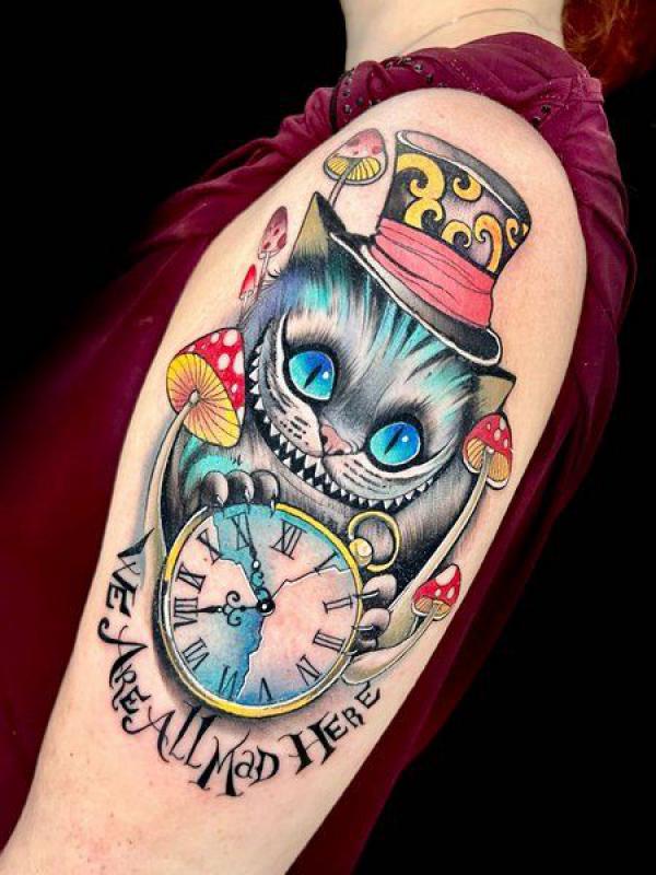 Cheshire Cat holding a clock tattoo sleeve
