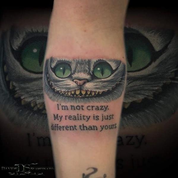 Cheshire Cat tattoo with quote I'm not crazy My reality is just different from yours