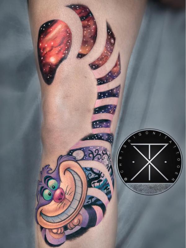 Cheshire Cat with a tail of galaxy tattoo
