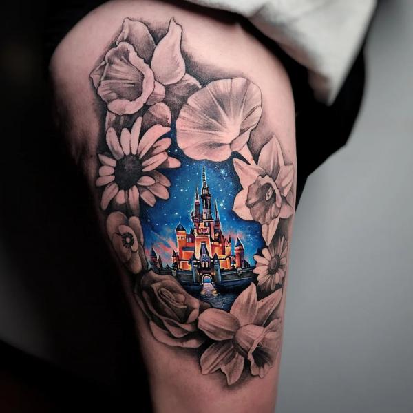 Cinderella Castle under starry night surrounded with black and grey flowers