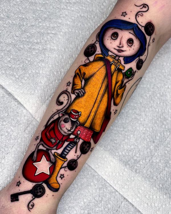 Colored Coraline and jumping mice forearm tattoo