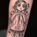 Coraline with spider web tattoo