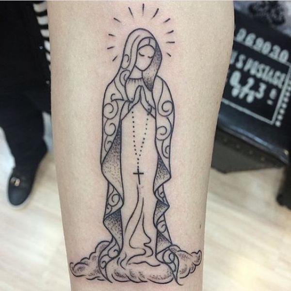 Fine line Virgin Mary tattoo