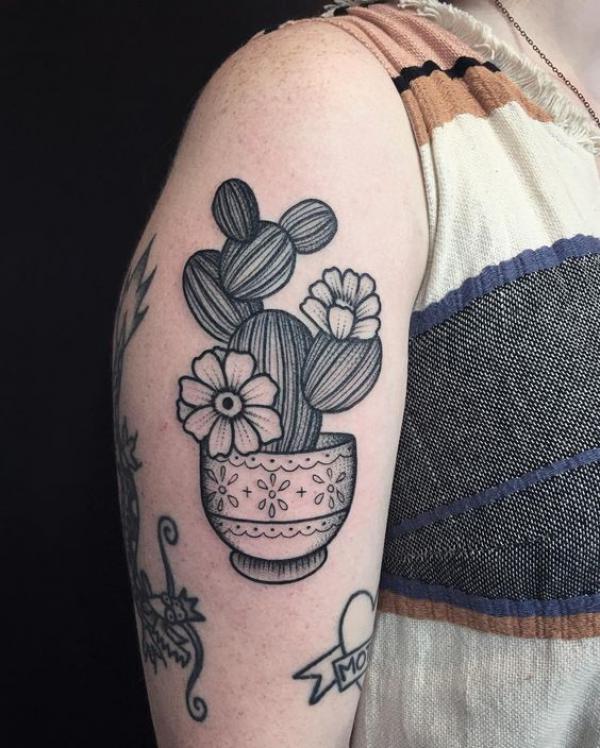 Fine line cactus and pot tattoo
