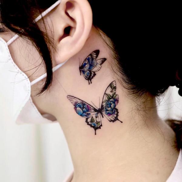 Floral butterfly neck tattoo for girl