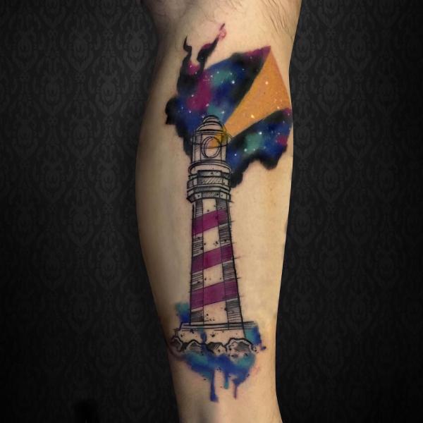 Galaxy and lighthouse tattoo