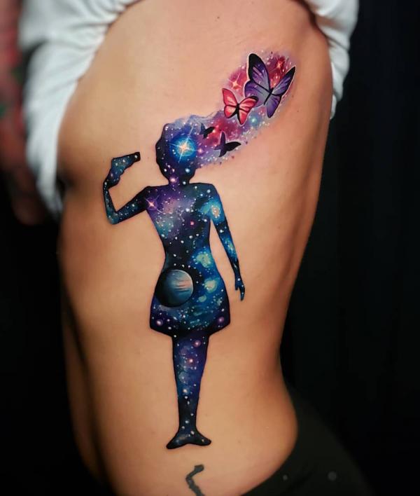 Galaxy girl and butterfly tattoo on side