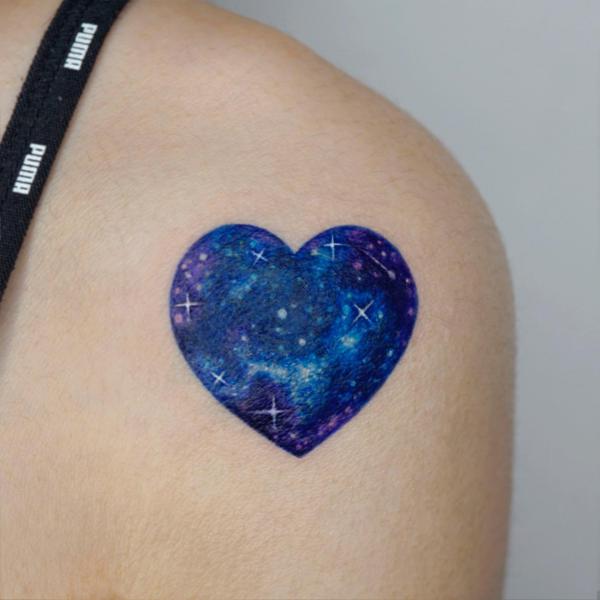 Galaxy heart shoulder tattoo