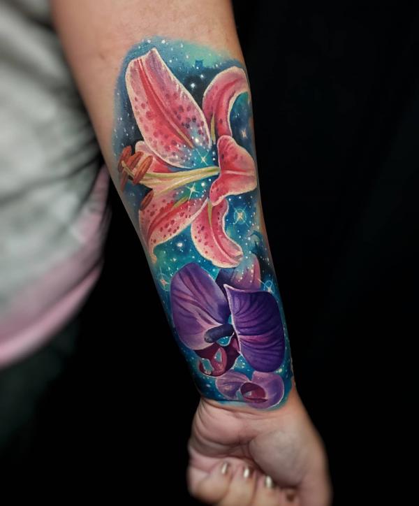 Galaxy lily and orchid tattoo