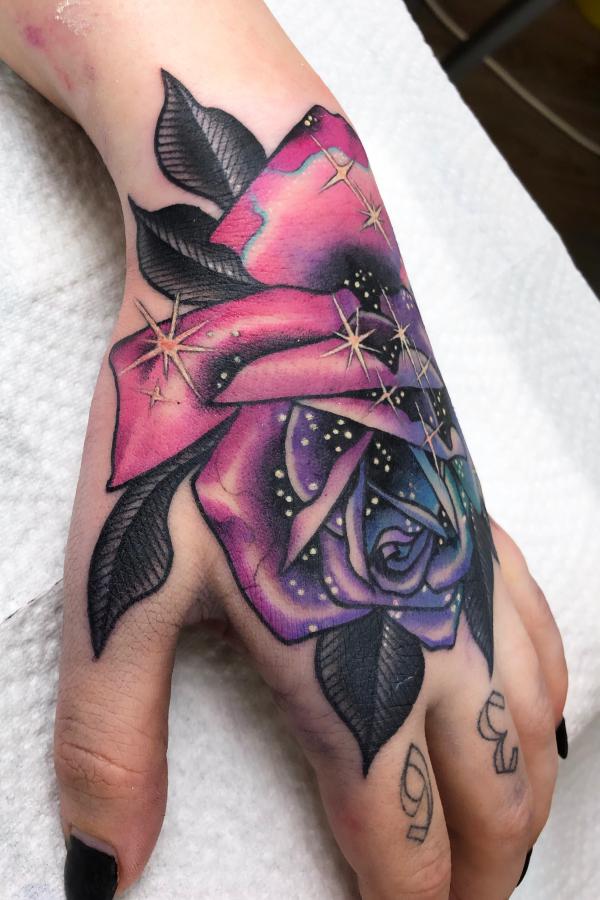 Galaxy rose hand tattoo