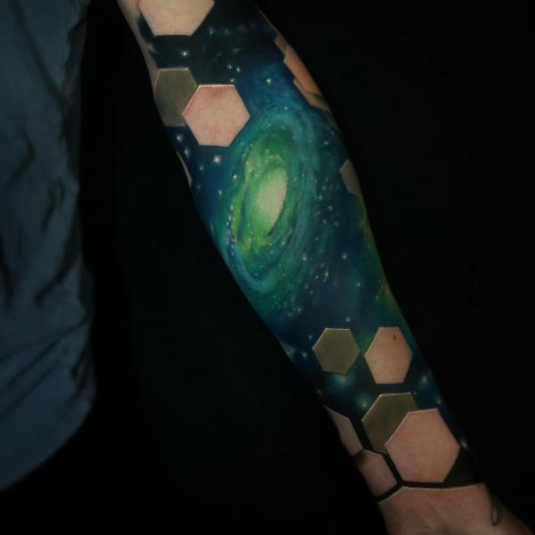 Geometric galaxy sleeve tattoo