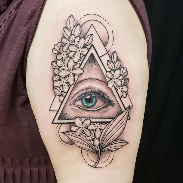 Geometric lilac and all seeing eye tattoo