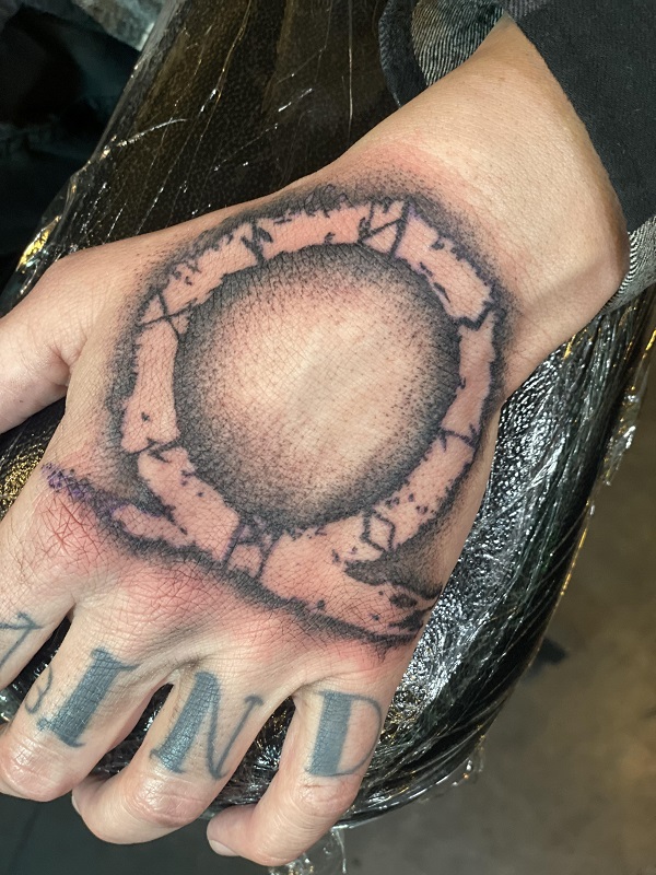 God of war Omega mark hand tattoo