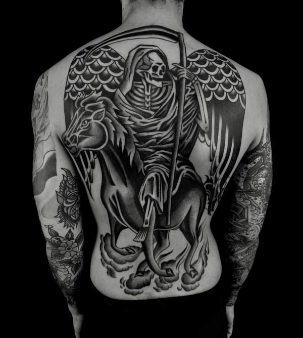 Grim reaper with wings riding a horse