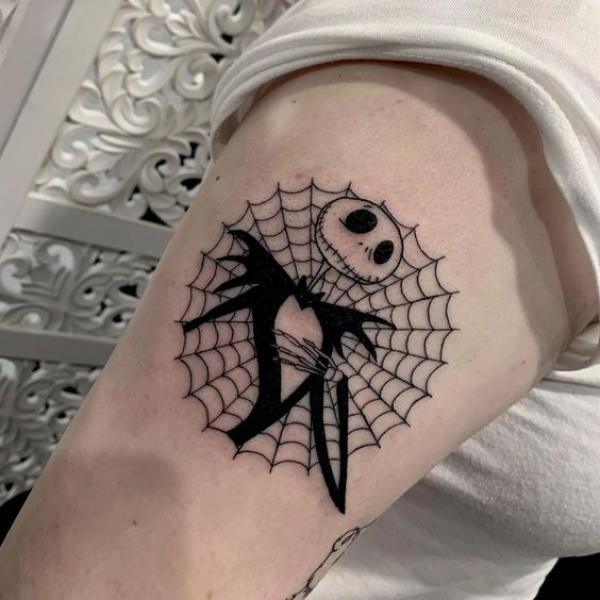 Jack Skellington spider web tattoo