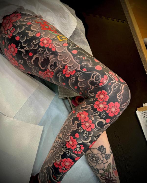 Japanese style cherry blossom leg tattoo