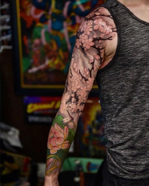 Japanese cherry blossom and lotus tattoo