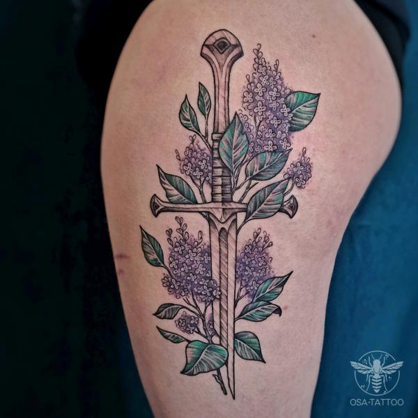Lilac and sword tattoo
