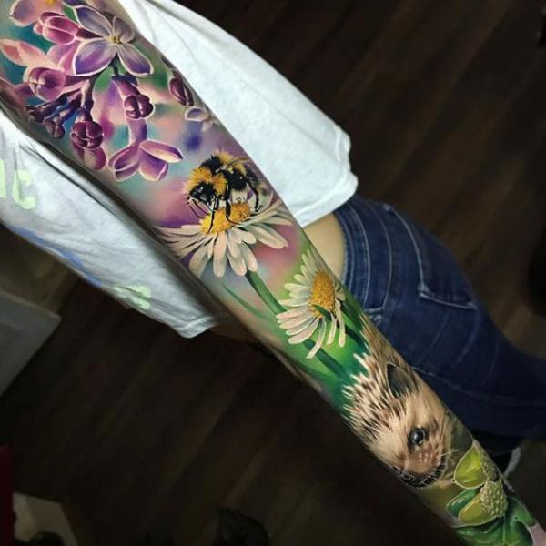 Lilac daisy and bee hedgehog full sleeve tattoo