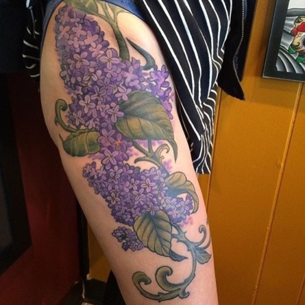 Lilac thigh tattoo