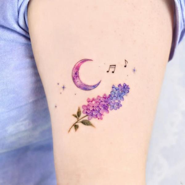 Lilac with music notes crescent moon and stars tattoo