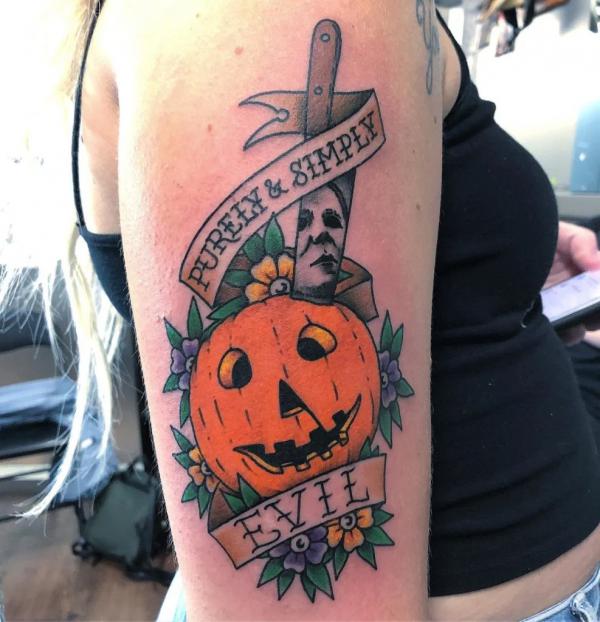 Michael Myers knife pierced a pumpkin with quotes