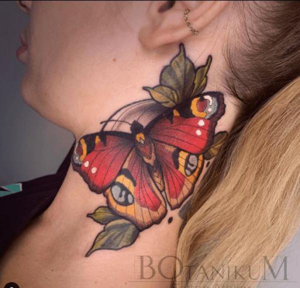 Neo traditional butterfly neck tattoo