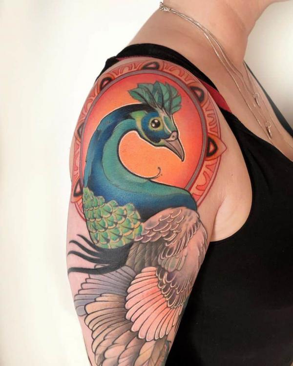 Neo traditional peacock tattoo