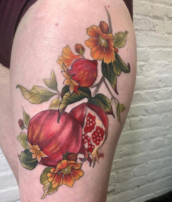 Neo traditional pomegranate botanical tattoo