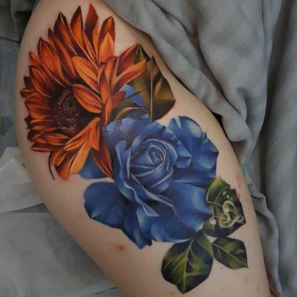 Neo traditional sunflower and blue rose tattoo