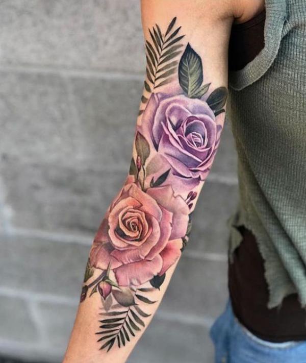 Pink and purple roses tattoo on sleeve