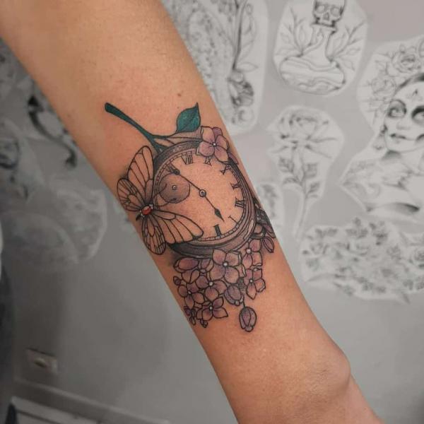 Pocket watch butterfly with lilac flower tattoo