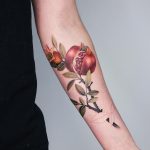 Pomegranate branch tattoo