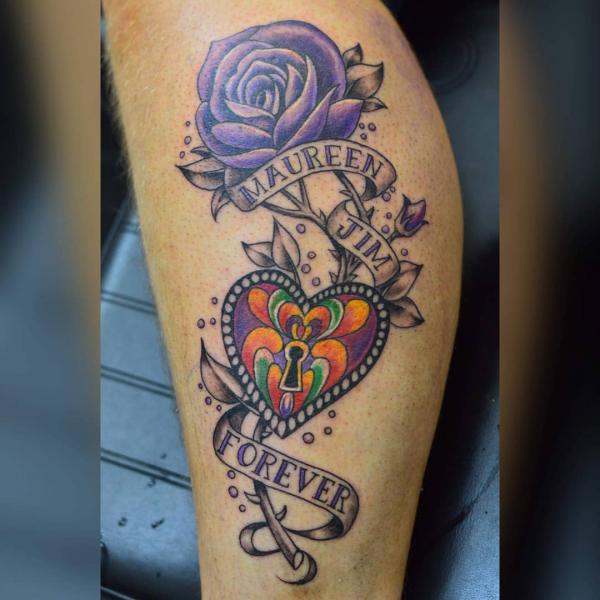 Purple rose with heart symbol and banner bearing a name