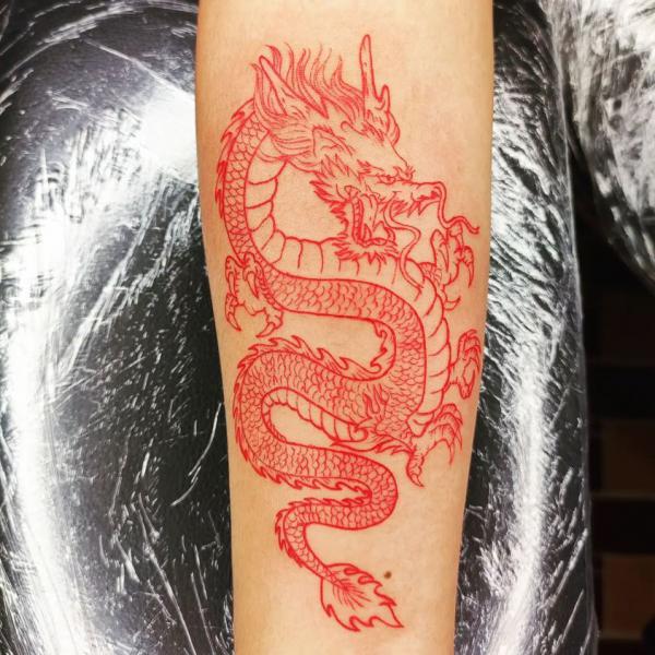 Red Dragon forearm tattoo