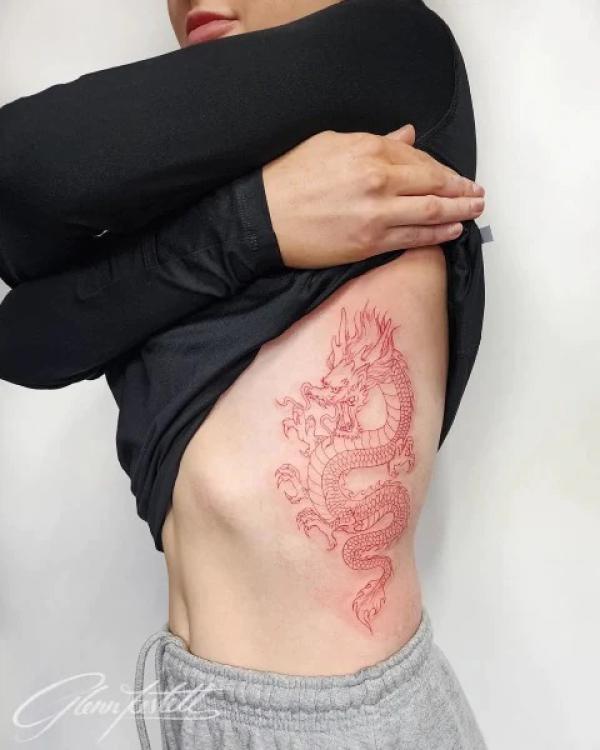 Red dragon side tattoo