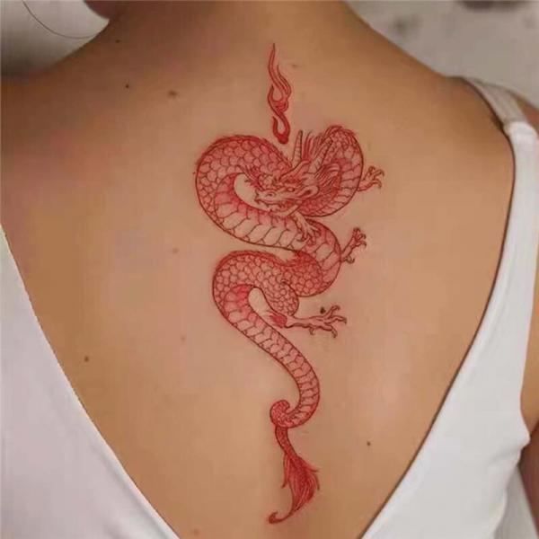 Red dragon spine tattoo