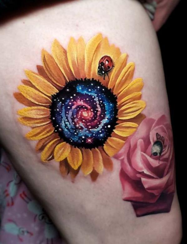 Rose and sunflower with bud of galaxy and ladybug tattoo