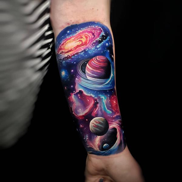 Spinning planets and galaxy inner forearm tattoo